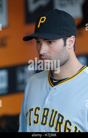 August 8, 2011; San Francisco, CA, USA;  Pittsburgh Pirates second baseman Neil Walker (18) stands in the dugout before the game against the San Francisco Giants at AT&T Park. Pittsburgh defeated San Francisco 5-0. Stock Photo