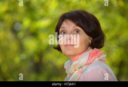 Portrait of a beautiful woman in nature Stock Photo