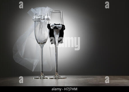 Two empty decorated champagne glasses for wedding party Stock Photo