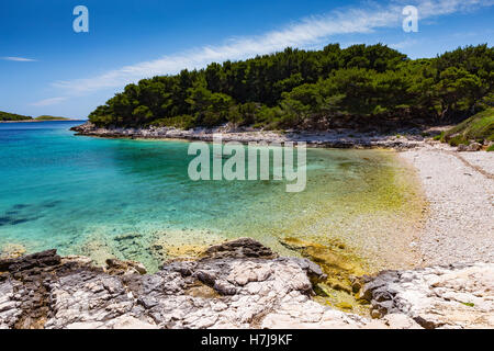 Pakleni islands. Paklinski otoci. Rocky coast and transparent Adriatic sea water. Croatia. Europe. Stock Photo