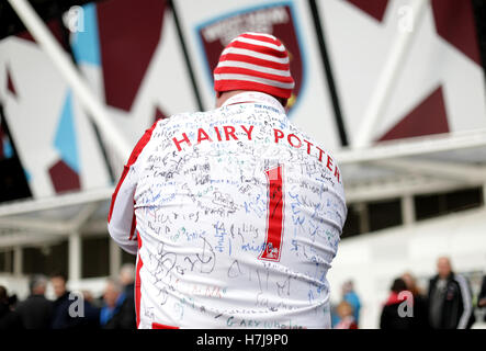 Stoke City fan Sean Ruane aka Hairy Potter with a poppy painted into his beard ahead of the Premier League match at London Stadium. Stock Photo