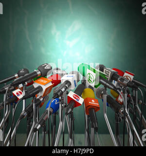 Microphones prepared for press conference or interview on  green background. 3d illustration Stock Photo