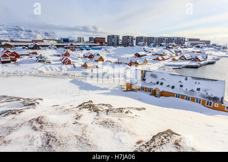 Old harbor and Nuuk city center covered in snow, Greenland Stock Photo