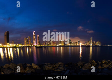 Panama City, Panama- June 08: Twilight Cityscape from across the bay in Panama with a serene reflection on the water. June 08 20 Stock Photo