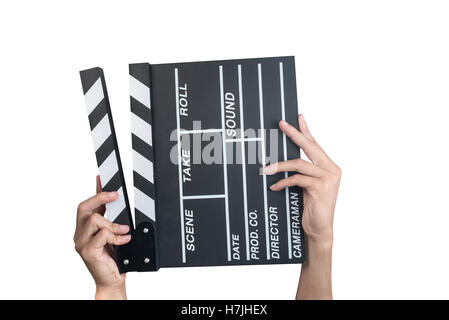 Man holding movie production clapper board isolated on white background Stock Photo