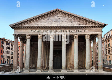 Facade colonnade and entrance to ancient roman temple Pantheon. City square in a heart of Italian roman capital with nobody Stock Photo