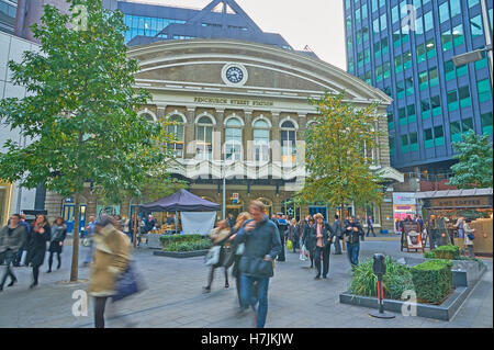 Commuters leaving Fenchurch Street station in the heart of London's financial district in the morning rush hour Stock Photo