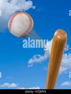 Baseball bat hitting  a super fast hardball. Stock Photo