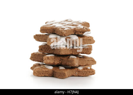 star shaped glazed cocoa christmas cookies isolated Stock Photo