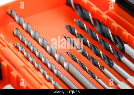 Drill bit set in box isolated on white background Stock Photo
