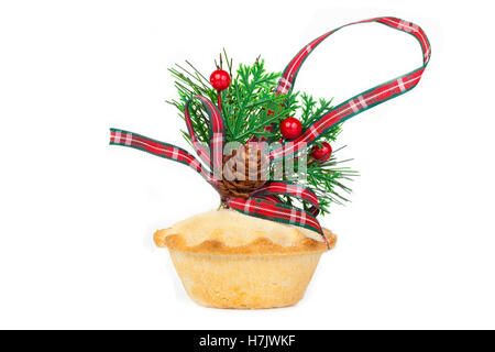 Christmas acorn and tartan ribbon arrangement on a mince pie on a pure white background Stock Photo