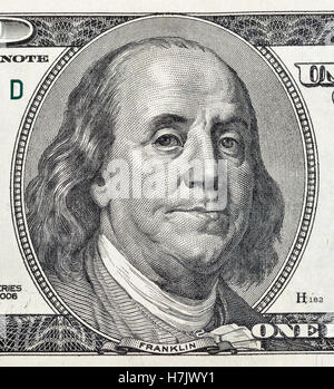 US President Benjamin Franklin portrait on one hundred dollar bill fragment macro Stock Photo