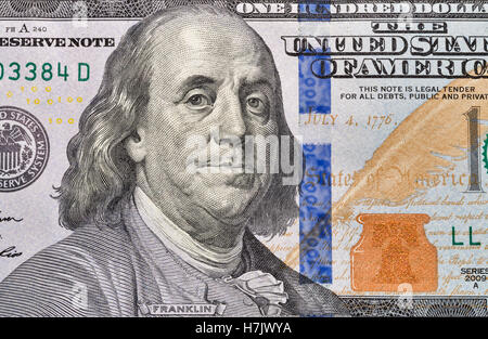 US President Benjamin Franklin portrait on one hundred dollar bill fragment macro Stock Photo