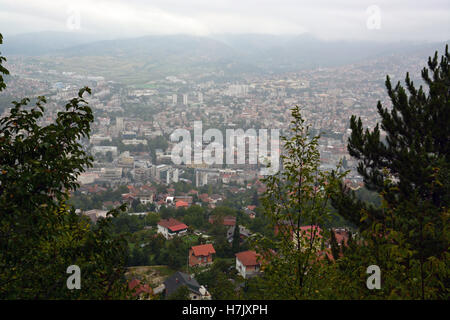 Overlooking the city of Sarajevo from a Serbian snipers nest on Mt. Trebvic left over from the Bosnian War. Stock Photo