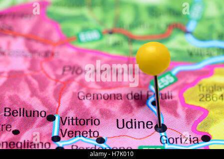 Udine pinned on a map of Italy Stock Photo