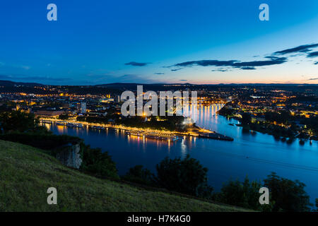 View of Deutsches Eck and the oldtown of Koblenz, Germany with  Rhine and Moselle River in the night. Stock Photo