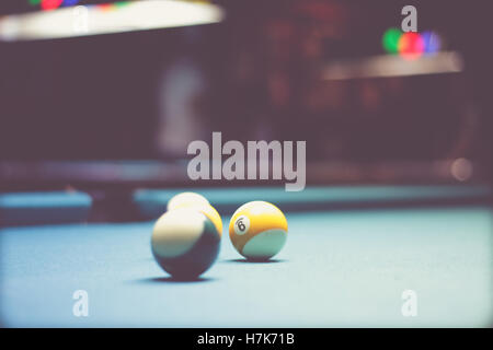 Photograph of some billiards plastic balls on table Stock Photo