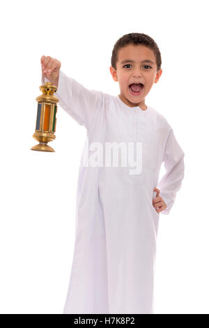 Happy Young Boy Holding Lantern Celebrating Ramadan Isolated on White Background Stock Photo