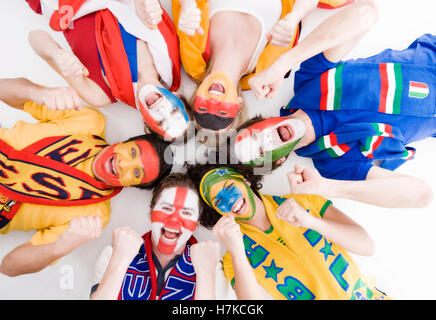 Soccer fans of different nations, soccer ball Stock Photo