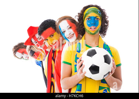 Soccer fans of different nations, soccer ball Stock Photo