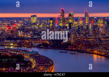 Aerial view of the London skyline at night, featuring illuminated ...
