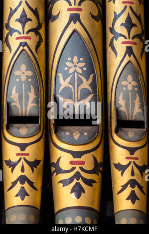 Decorated organ pipes in a church Stock Photo