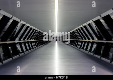Adams Place Bridge between One Canada Square and Crossrail Place in Canary Wharf, London Stock Photo