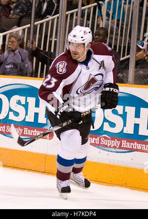 L-R) Colorado Avalanche players Milan Hejduk, John-Michael Liles, Curtis  Leschyshyn, and head coach Joel Quenneville model four generations of NHL Avalanche  jerseys at the Pepsi Center in Denver on September 12, 2007.