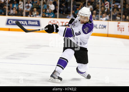 November 15, 2010; San Jose, CA, USA;  Los Angeles Kings defenseman Jack Johnson (3) shoots against the San Jose Sharks during the second period at HP Pavilion. San Jose defeated Los Angeles 6-3. Stock Photo