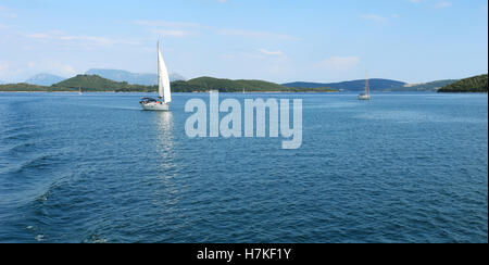 Lefkada, GREECE, May 11, 2013: Panoramic view with green islands, mountains and yachts in Ionian sea, Greece. Stock Photo