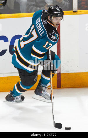 January 11, 2011; San Jose, CA, USA; San Jose Sharks center Torrey Mitchell (17) skates with the puck against the Toronto Maple Leafs during the third period at HP Pavilion. Toronto defeated San Jose 4-2. Stock Photo