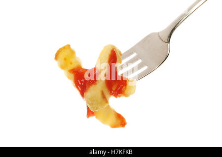 Potato chips with tomato ketchup on a fork isolated against white Stock Photo
