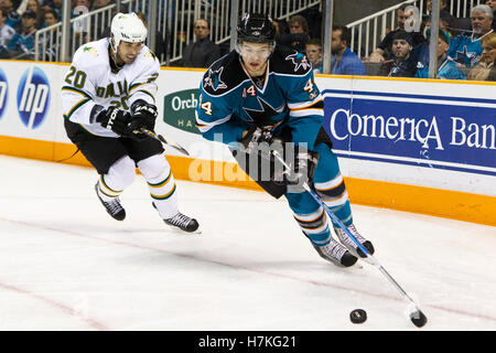 March 5, 2011; San Jose, CA, USA;  San Jose Sharks defenseman Marc-Edouard Vlasic (44) skates with the puck past Dallas Stars center Brian Sutherby (20) during the first period at HP Pavilion. Stock Photo