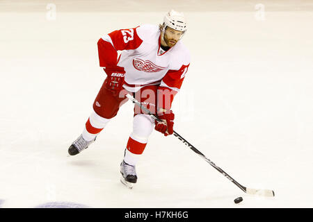 May 8, 2011; San Jose, CA, USA;  Detroit Red Wings defenseman Brad Stuart (23) skates with the puck against the San Jose Sharks during the first period of game five of the western conference semifinals of the 2011 Stanley Cup playoffs at HP Pavilion. Stock Photo