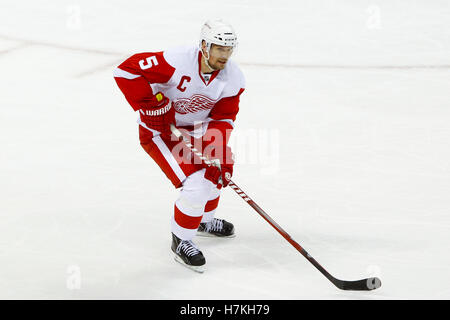 May 8, 2011; San Jose, CA, USA;  Detroit Red Wings defenseman Nicklas Lidstrom (5) skates with the puck against the San Jose Sharks during the second period of game five of the western conference semifinals of the 2011 Stanley Cup playoffs at HP Pavilion. Stock Photo