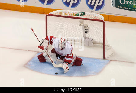 May 8, 2011; San Jose, CA, USA; Detroit Red Wings goalie Jimmy Howard (35) makes a save against the San Jose Sharks during the third period of game five of the western conference semifinals of the 2011 Stanley Cup playoffs at HP Pavilion. The Red Wings defeated the Sharks 4-3. Stock Photo