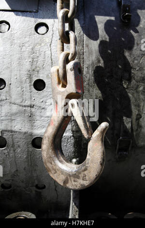 Industrial crane hook and stainless metal chain shackles Stock Photo