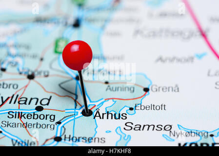 Close up to a Arhus city with a red pin needle into Denmark country ...