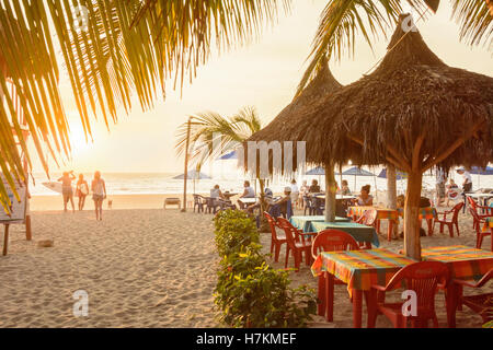 Sunset at the beach in San Francisco ('San Pancho'), Nayarit, Mexico. NOTE: ARCHIVAL IMAGE from 2015. The restaurant on the beach has been updated. Stock Photo