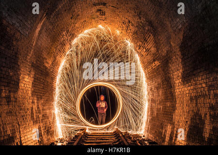 Helensburgh, Australia - 4th November 2016: Helensburgh tunnel near the old Helensburgh train station. This tunnel built between 1884 and 1886 is said to be haunted by the coal miner Robert Hales who passed away on the 13th of June 1895 after being struck by a passing steam train. Some say his ghost can be seen running from the darkness as trying to flee potential trains. - Helensburgh, New South Wales, Australia Stock Photo