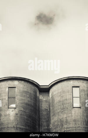 Exterior of old industrial building. Concrete architecture. Abandoned factory. Stock Photo