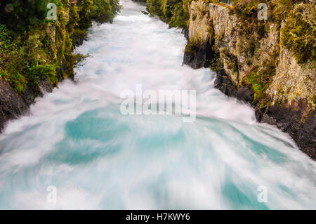 The rushing wild stream of Huka Falls near Lake Taupo, New Zealand Stock Photo