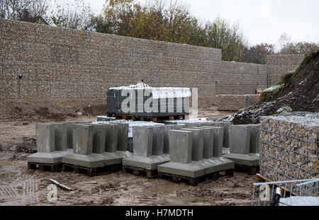 Munich, Germany. 07th Nov, 2016. Blocks for a stone wall can be seen on the building site of a refugee camp in Munich, Germany, 07 November 2016. Residents implemented the wall for noise protection in the Neuperlach district. The accommodation for refugee youths is not yet in operation. Photo: SVEN HOPPE/DPA/Alamy Live News Stock Photo