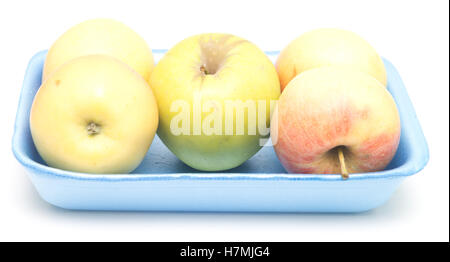 apples in blue plastic tray isolated on white background Stock Photo