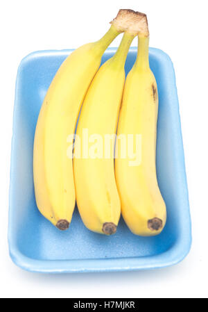 bananas in plastic tray isolated on white background Stock Photo