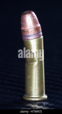 Rimfire cartridge bent at an angle when it tried to enter the chamber Stock Photo