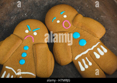 Angry and scared gingerbread men Stock Photo
