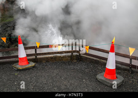 Traffic cone and safety bunting at Deildartunguhver hot spring in Iceland Stock Photo