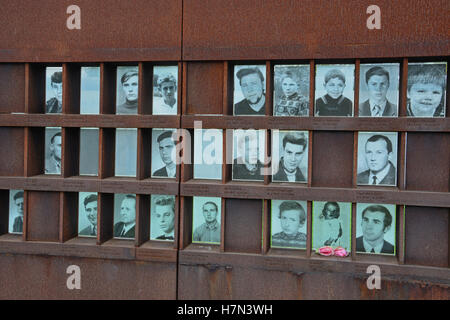 A memorial located on Bernauer Strasse shows the faces of East Berliners killed at the Berlin Wall. Stock Photo