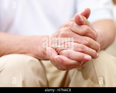 close-up of a pair of senior male's hands, side view Stock Photo